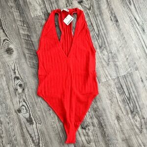 Free people size small red/orange body suit